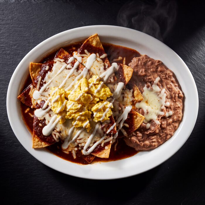 Chilaquiles A la Diabla, seen from above on a white plate.